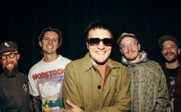 Neck Deep Band Posing in front of a black background.