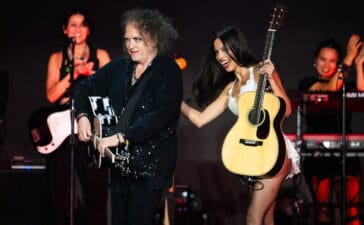 Olivia Rodrigo’s Guitarist “Started Crying” After Learning Robert Smith Would Join Glastonbury Set