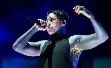 Falling In Reverse's Ronnie Radke Revisits 2012 Mic Stand Incident With Inflatable Stunt at Warped Tour