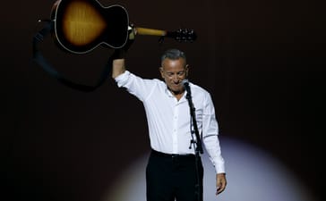 HOLLYWOOD, CALIFORNIA - OCTOBER 22: Bruce Springsteen performs onstage during the AFI Los Angeles Premiere of 20th Century Studios' "Springsteen: Deliver Me From Nowhere" at The TCL Chinese Theater in Hollywood, California on October 22, 2025. (Photo by Jesse Grant/Getty Images for 20th Century Studios)