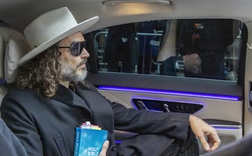 Russell Brand leaves the court in London