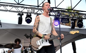Jack Kays performing live with guitar at Riptide Music Festival in 2023.