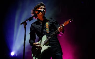 Darren Middleton of Powderfinger performs on stage at Big Day Out in Sydney in January 2010.