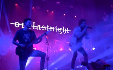 Our Last Night performing under purple and blue stage lighting at August Hall in San Francisco.