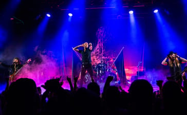 Soen performing under blue and purple stage lights at Rockefeller Music Hall in Oslo.