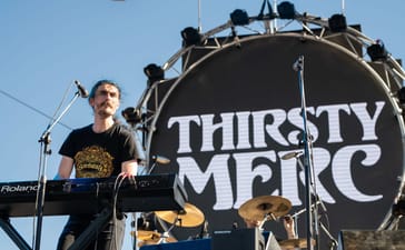 Rai Thistlethwayte of Thirsty Merc performs at Big Red Bash in Birdsville in July 2021