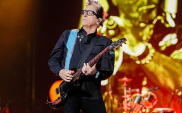 Noodles playing guitar with The Offspring at Sea.Hear.Now festival in September 2026