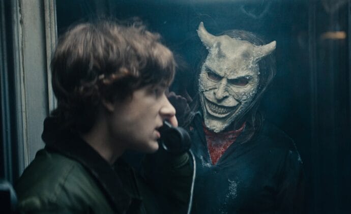 (from left) Finn (Mason Thames) and The Grabber (Ethan Hawke) in Black Phone 2, written and directed by Scott Derrickson.