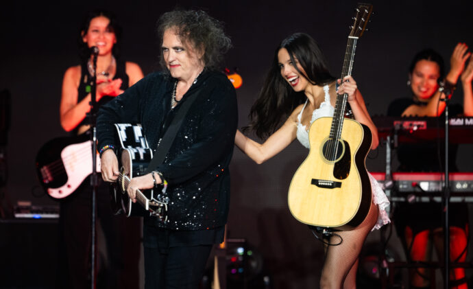 Olivia Rodrigo’s Guitarist “Started Crying” After Learning Robert Smith Would Join Glastonbury Set