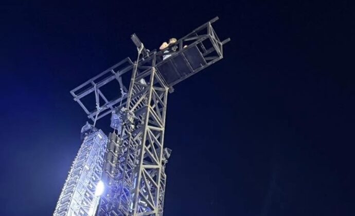 Man climbs tower at Metallica Perth concert