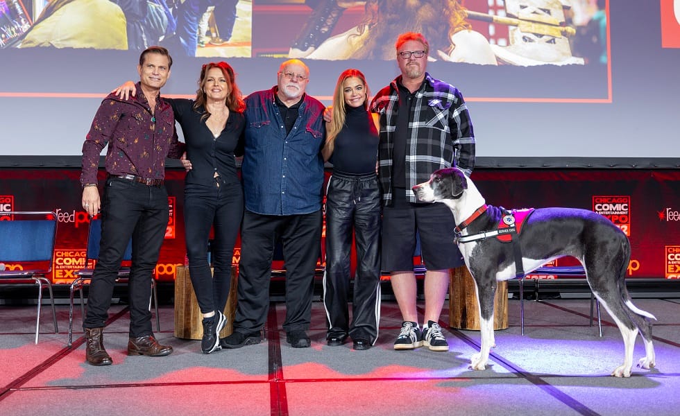 CHICAGO, ILLINOIS - APRIL 13: Actors Casper Van Dien, Dina Meyer, Michael Ironside, Denise Richards and Jake Busey with his dog Kali during C2E2 on the main stage for the "The Only Good Bug Is a Dead Bug: A Starship Troopers Reunion” at McCormick Place on April 13, 2025 in Chicago, Illinois. (Photo by Barry Brecheisen/WireImage)