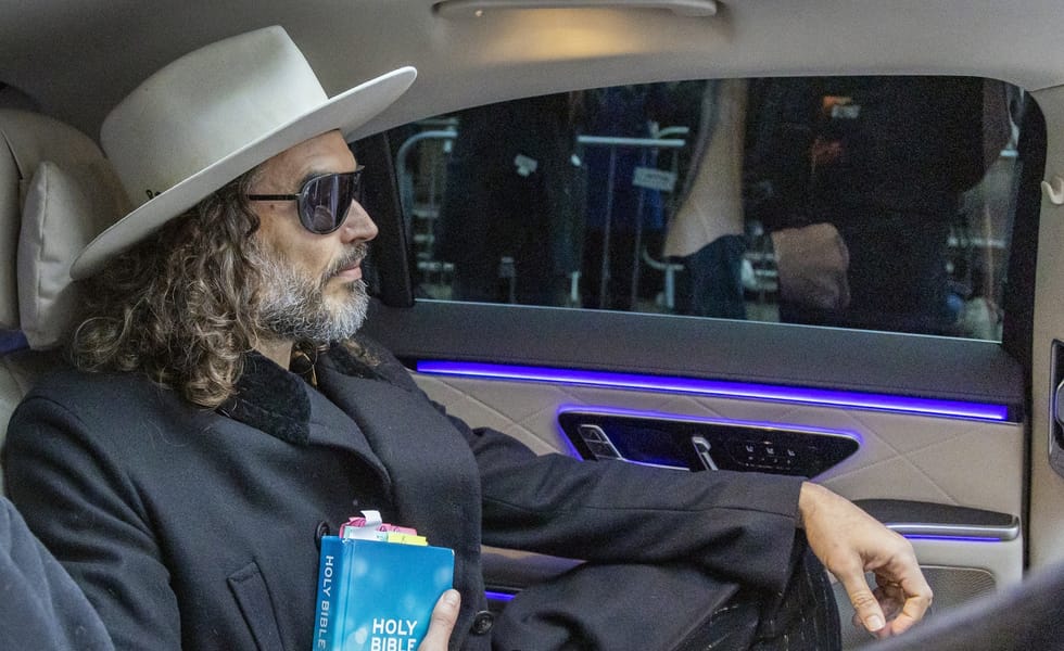 Russell Brand leaves the court in London