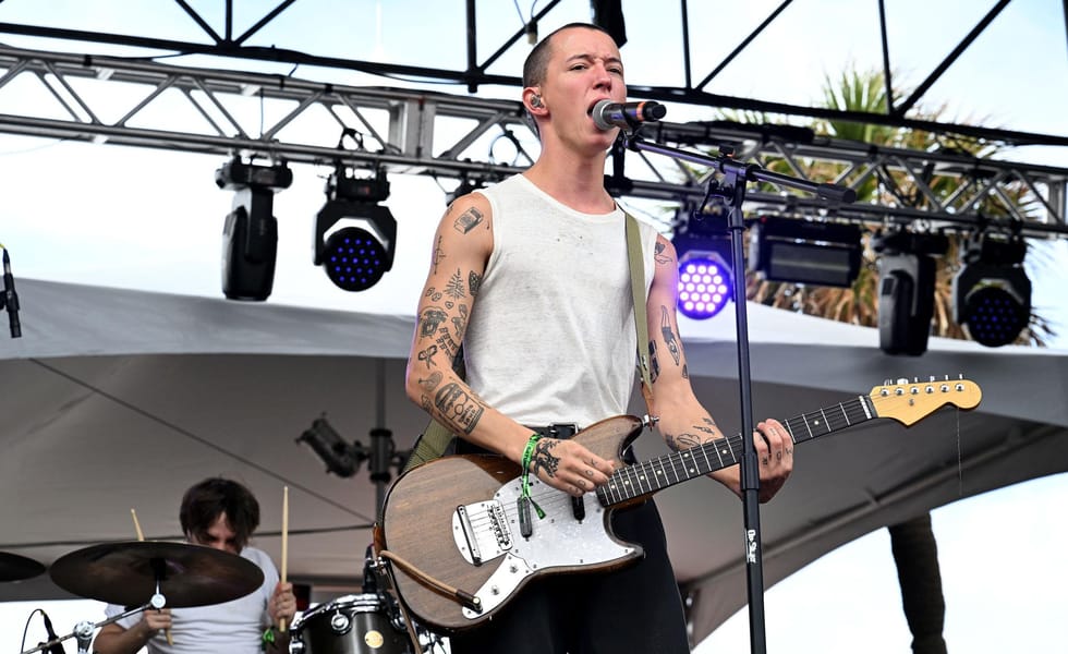 Jack Kays performing live with guitar at Riptide Music Festival in 2023.