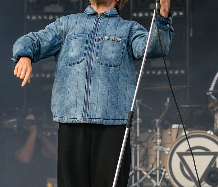 Enter Shikari frontman Rou Reynolds onstage at Leeds Festival in 2025