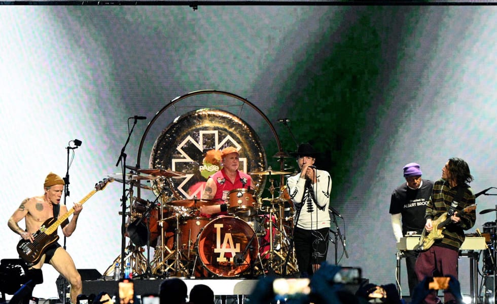 Red Hot Chili Peppers perform together on stage at the 2025 FIREAID benefit in Inglewood.