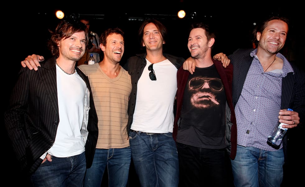 The five members of Powderfinger pose together at the Annandale Hotel in Sydney in 2010.