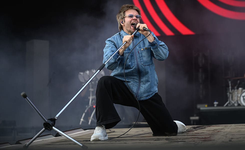 Rou Reynolds of Enter Shikari performing at Leeds Festival 2025