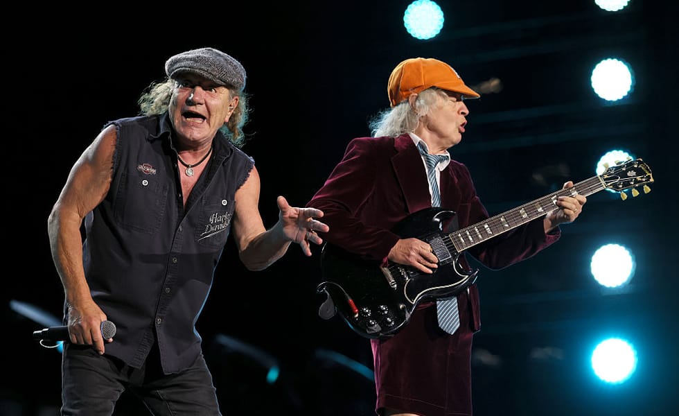 Brian Johnson and Angus Young of AC/DC performing at MetLife Stadium