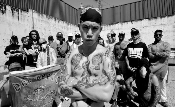 SPEED press shot with crowd behind the band. Black and white image.