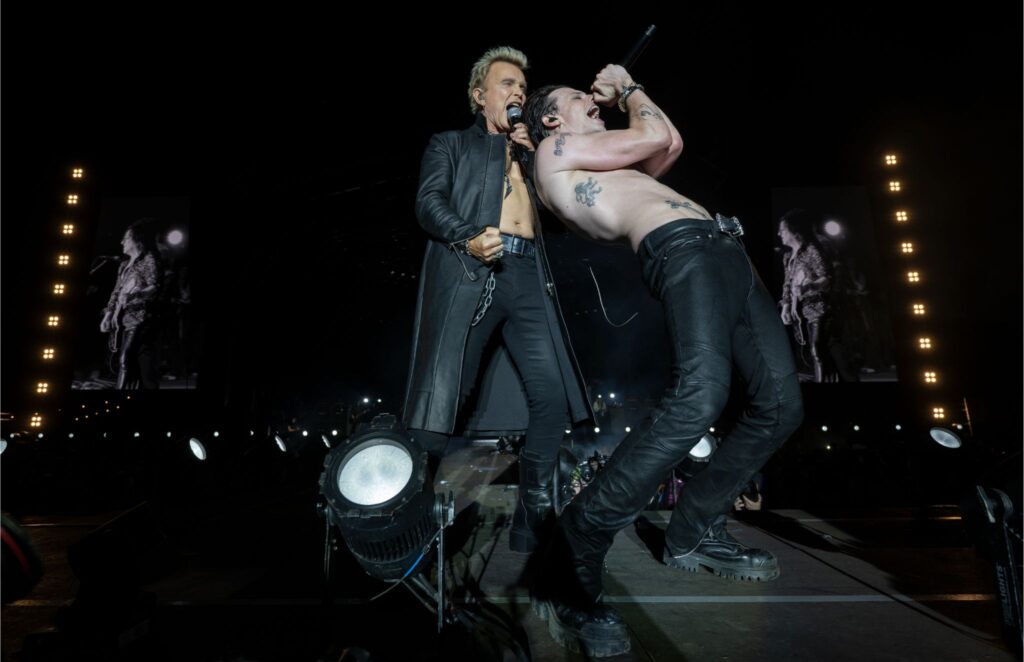 MILTON KEYNES, ENGLAND - JUNE 21: Yungblud and Billy Idol perform at Bludfest at The National Bowl on June 21, 2025 in Milton Keynes, England. (Photo by Joseph Okpako/WireImage)