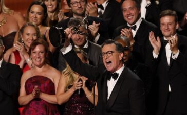 TOPSHOT - US comedian writer Stephen Colbert accepts the Outstanding Talk Series award for "The Late Show with Stephen Colbert" onstage during the 77th Primetime Emmy Awards at the Peacock Theatre at LA Live in Los Angeles on September 14, 2025. (Photo by VALERIE MACON / AFP) / RESTRICTED TO EDITORIAL USE (Photo by VALERIE MACON/AFP via Getty Images)