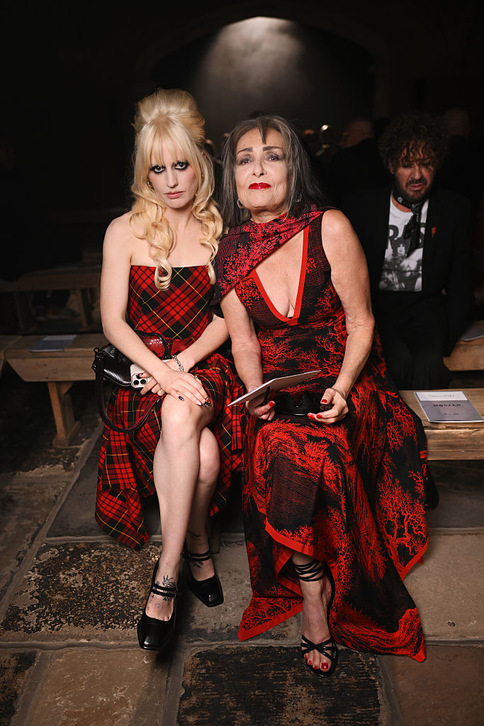 Amy Taylor of Amyl and the Sniffers with Siouxsie Sioux at the McQueen Spring/Summer 2027 show during London Fashion Week on September 20, 2026.